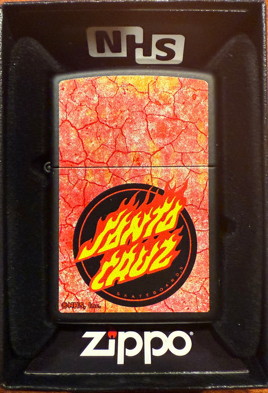 Zippo lighter with a black matte finish and a red and yellow Santa Cruz Dot Flames graphic on the front.