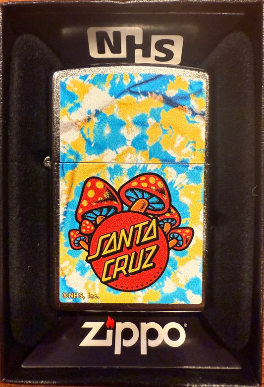 A Zippo lighter with a color imaged Santa Cruz Skateboards' iconic mushrooms graphic on the front, packaged in a black gift box with 'NHS' text on the top.